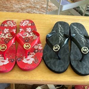 2 pairs Michael Kors flip flops. Black pair is NWOT, red pair great condition